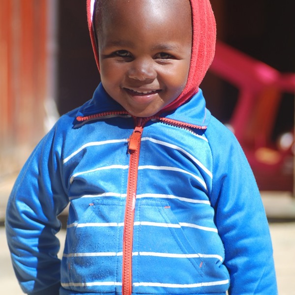 Barn smiler i township i Cape Town